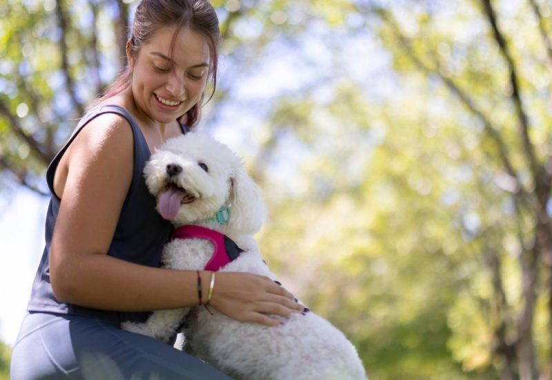 woman walking with dog